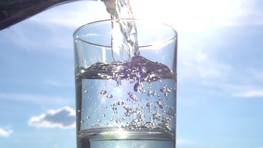 Налить в стакан половину воды. Залить стаканом воды. Pouring Water into Glasses. Into the Water. Water pouring from a Glass.